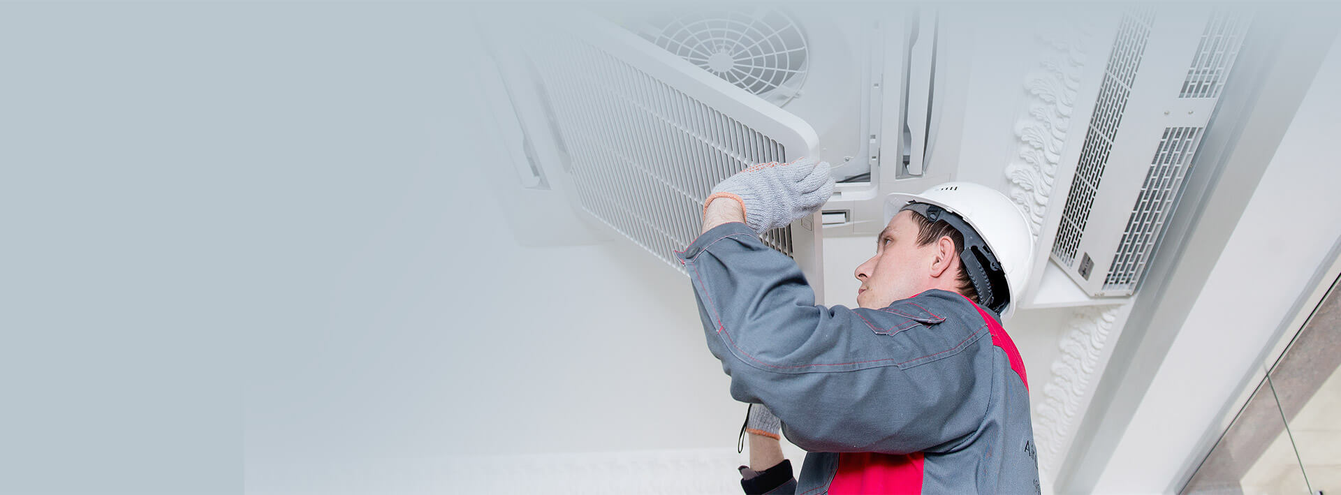 Atlas Air Conditioning technician servicing a Houston home AC unit