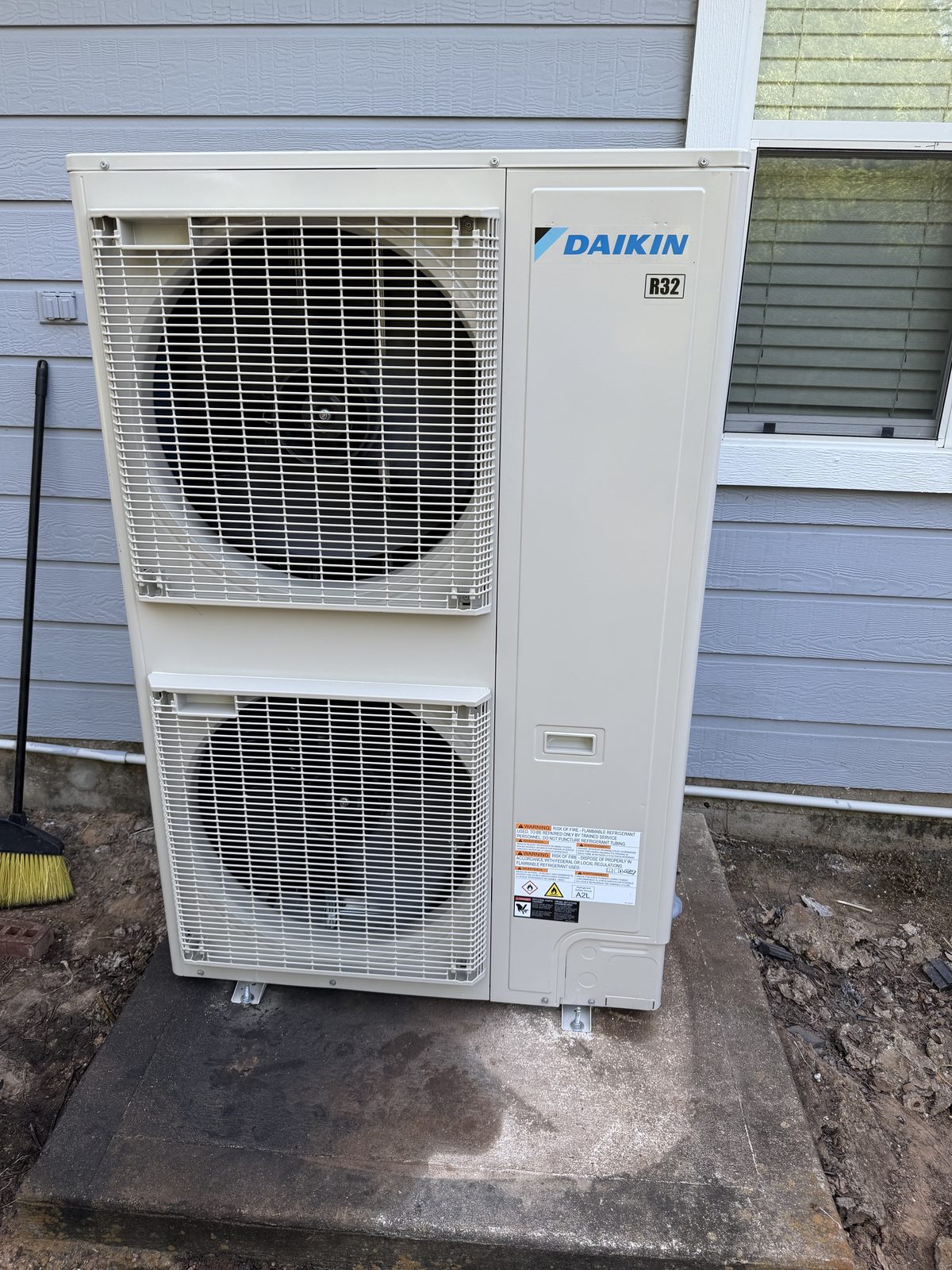 Daikin condenser installed by Atlas Air Conditioning at a Houston home